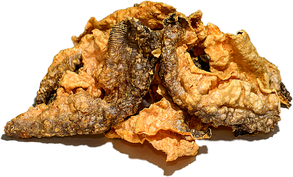 A pile of freshly fried Carlos fish skin chips
